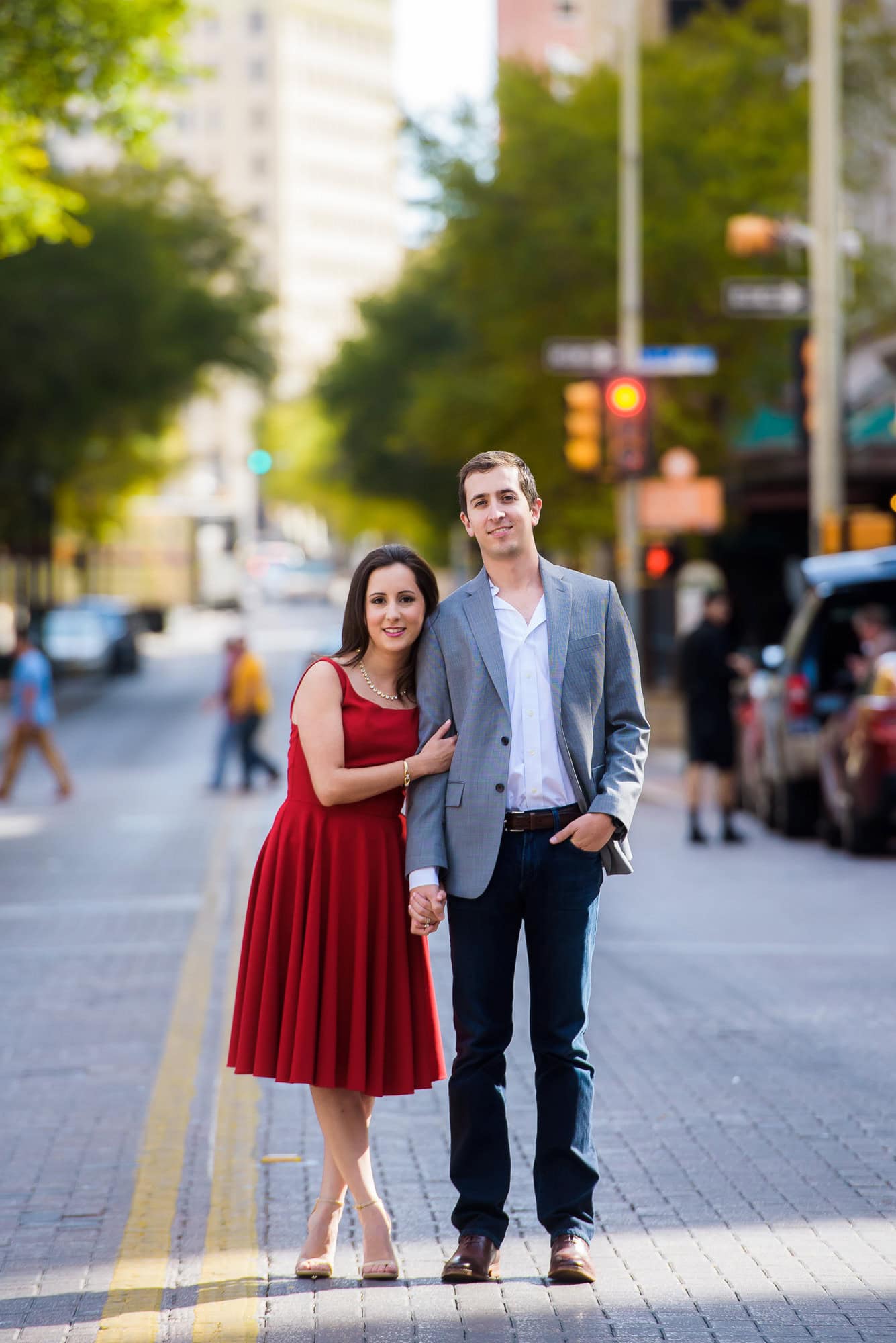 Vanessa & Matthew's Downtown San Antonio Engagement Session | Couple standing in street