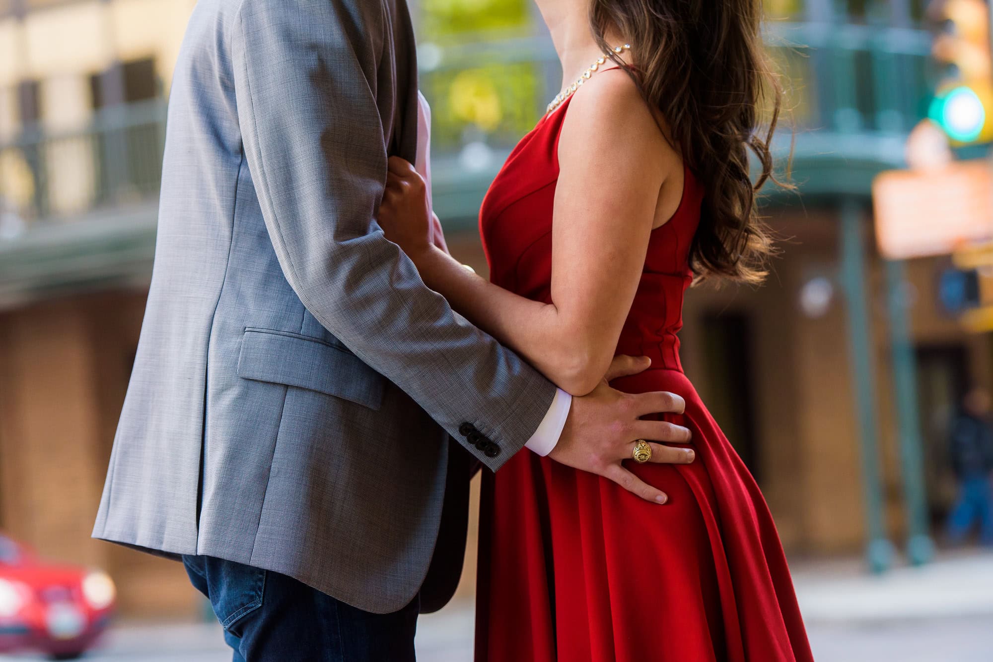 Vanessa & Matthew's Downtown San Antonio Engagement Session | Close-up of couple's embrace in downtown