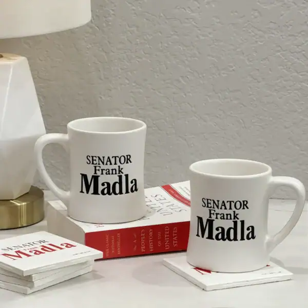 (2) Senator Frank Madla Mugs